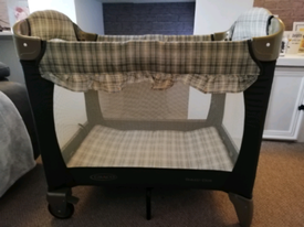 graco travel cot colourful